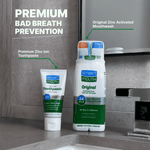 SmartMouth toothpaste tube displayed next to a SmartMouth mouthwash bottle on a bathroom sink with text calling out bad breath prevention.