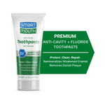 Tube of SmartMouth anti-cavity toothpaste with green label and Zn²+ badge beside green infographic panel highlighting premium fluoride benefits.