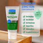 SmartMouth toothpaste tube on a wooden surface with checklist-style callouts stating no burning, no alcohol, sugar free and other features.