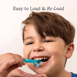 Smiling child having floss inserted with a turquoise COCOLAB flosser, overlaid headline reads 'Easy to Load & Re-Load'