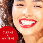 Close-up smiling model showing bright teeth with a red circle graphic stating cleans & whitens for Colgate Optic White