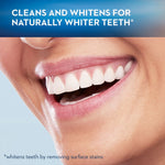 Close crop of a smiling mouth and teeth with text claiming cleans and whitens for naturally whiter teeth
