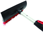 Close-up of snow broom head with black plastic scraper and red bristles attached to an aluminum pole