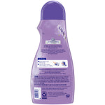 Rear view of Snuggle Lavender Breeze booster bottle showing usage instructions, product copy and a purple cap on a white background.
