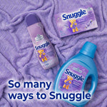 Flat lay on purple blanket showing Snuggle Lavender Breeze dryer sheets box with Snuggle fabric spray and liquid detergent