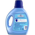 Rear view of a blue Snuggle SuperFresh fabric softener bottle showing usage instructions and product labeling