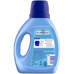 Rear view of a blue Snuggle SuperFresh bottle showing the back label with usage directions, warnings and barcode.