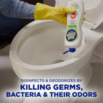 Person wearing a yellow glove pouring Soft Scrub bleach cleanser into a toilet bowl from a slanted bottle