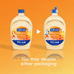 Two Softsoap milk & honey refill bottles on orange background with text noting packaging may vary