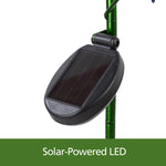 Close-up of oval solar panel housing attached to a green metal garden stake against a white background