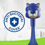 Sonic-shaped antibacterial toothbrush cover displayed next to a circular anti-bacterial cover emblem