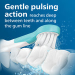 Close-up illustration of a Sonicare brush head cleaning teeth with pulsing action text
