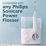 Philips Sonicare Power Flosser unit displayed on a stand with text stating compatibility with any Sonicare Power Flosser.