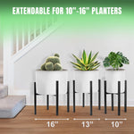 Three black adjustable plant stands with white planters and size labels 16", 13", 10"