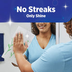 Person wiping a mirror with a patterned Sparkle paper towel, overlay text 'No Streaks Only Shine' on blue banner