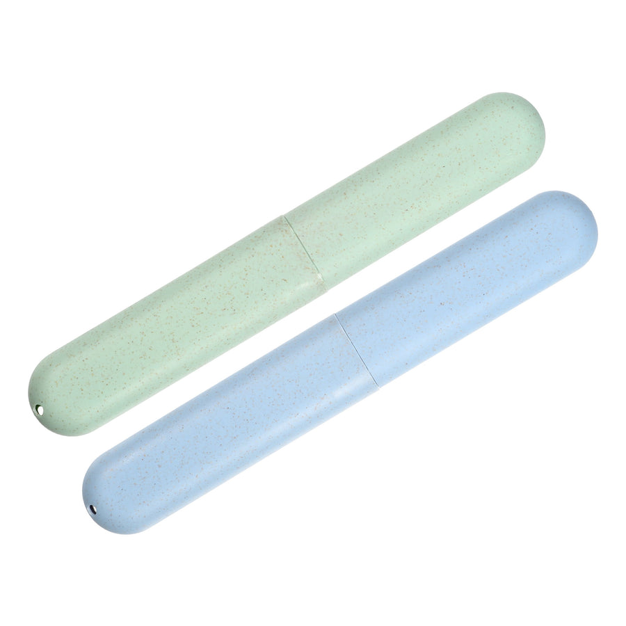 Two cylindrical toothbrush travel cases in speckled pale green and light blue, shown side by side on white background.