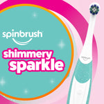 Close-up promotional graphic of a teal Shimmery Sparkle Spinbrush handle with bold 'shimmery sparkle' text on a pink background.