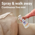 Hand holding a Clorox Disinfecting Mist bottle spraying a continuous fine mist onto a couch with 'spray & walk away' text