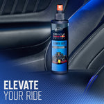 Armor All Oracle Red Bull Racing 'Lights Out' spray bottle placed on a car seat with elevated lighting