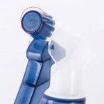 Close-up of a blue spray bottle trigger showing the adjustable nozzle cap with ‘open twist’ text circled in red.