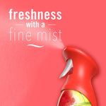 Close-up of a red spray trigger misting on a coral background with copy reading ‘freshness with a fine mist’
