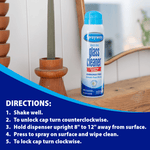 Sprayway glass cleaner can positioned on a wooden shelf beside a candle holder in a home setting