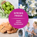Circular magenta badge reading 'Spring Fresh' over photos of green apples, jasmine flowers, sandalwood and laundry scene