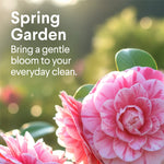 Close-up of pink camellia-like flowers with text 'Spring Garden Bring a gentle bloom to your everyday clean'