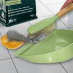 Hand using a green brush and dustpan to sweep up a messy spill on tiled floor with a Sprinkle & Sweep product bag visible in the background.