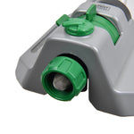 Macro view of the sprinkler's green threaded hose connector and integrated fine-mesh filter screen.
