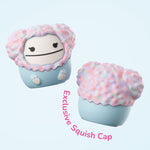 Two views of the exclusive Squishmallows Zozo squish cap in pastel pink and blue shown as a removable cover.