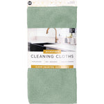 Packaged S&T microfiber cleaning cloth with kitchen sink photo on the label and sage-green cloth visible