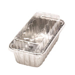 Stacked aluminum mini loaf pans with a clear plastic clamshell lid, photographed on white background