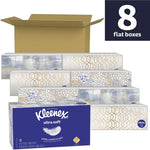 Stacked Kleenex Ultra Soft flat tissue boxes with decorative patterns and an open brown shipping carton; '8 flat boxes' badge visible.