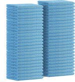 Two tall stacks of folded light blue microfiber cleaning cloths photographed on white background.