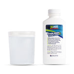 Stain Away Plus denture cleanser bottle beside a clear cup of solution on a white background