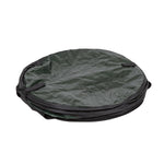 Stansport collapsible trash can folded flat into a circular form, showing its compact storage position on white background.