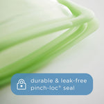 Close-up macro of a light green silicone pinch-loc seal on a Stasher bag with a blue callout stating durable & leak-free