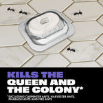 Close-up lifestyle-style image of a spill-proof bait station on tiled floor with illustrated ants nearby