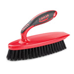 Studio shot of a Libman red scrub brush with black ergonomic handle and dense black bristles