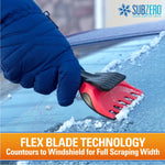 Gloved hand using a red and black SubZero ice scraper to remove frost from a windshield; SubZero logo visible.