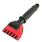 Red and black SubZero ice scraper with short handle and rubber grip shown on white background, angled view of blade.