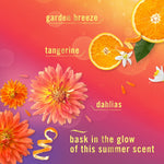 Colorful floral and citrus graphic with labels garden breeze, tangerine, dahlias on a warm gradient background