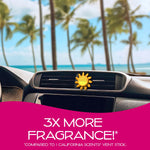 Sun-shaped vent air freshener clipped to car vent with palm trees and ocean background