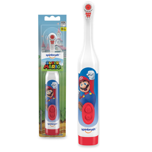 White and red Super Mario themed Spinbrush electric toothbrush shown next to its retail blister packaging featuring Mario artwork.