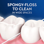 Illustration of teeth and gum with floss between molars and headline text reading ‘Spongy-floss to clean in wide spaces’