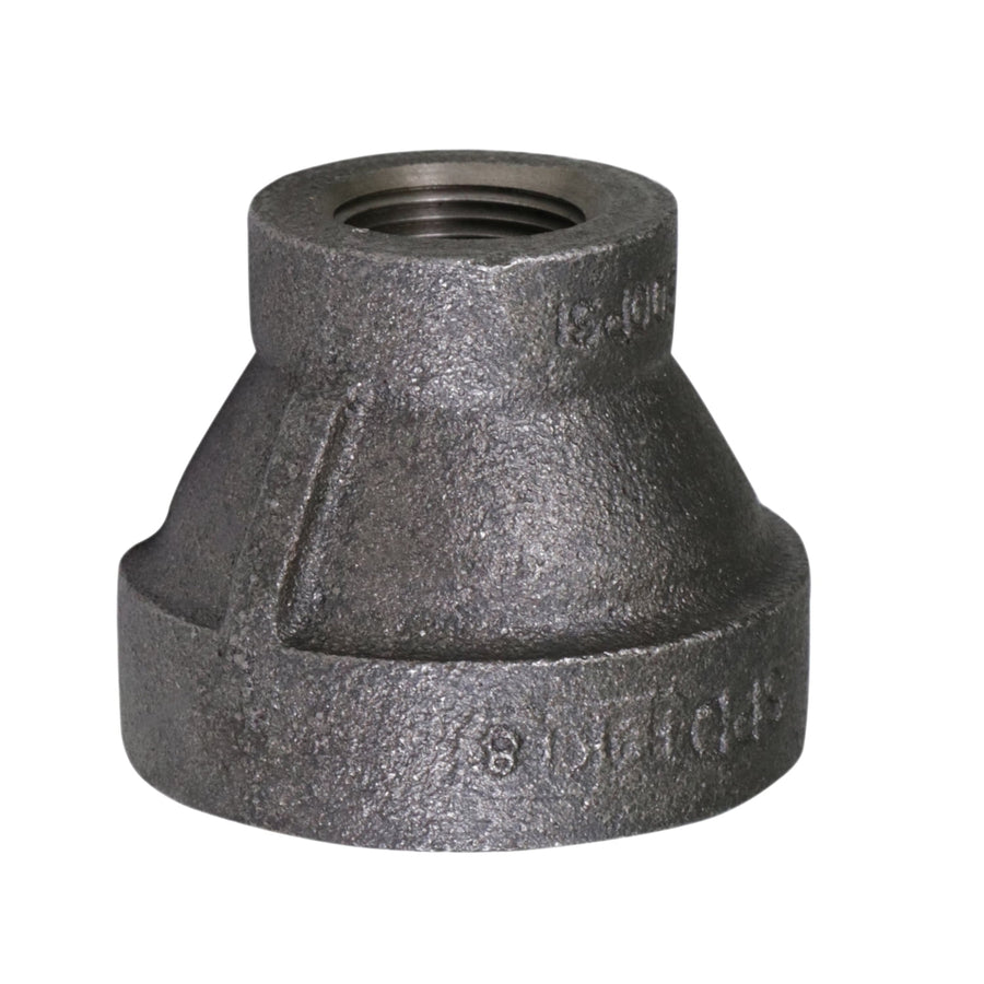 Close-up of a black cast-iron hex reducing coupling with visible threaded female bore and textured finish.