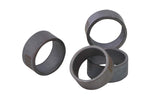 Cluster of Supply Giant PEX crimp rings shown as cylindrical metal pipe fittings on a white background