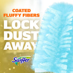 Close-up of a blue Swiffer duster refill with text 'Coated Fluffy Fibers Lock Dust Away' and Swiffer logo.