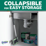 Product-in-cabinet photo demonstrating the Swiffer mop collapsed for compact under-sink storage with other cleaning items